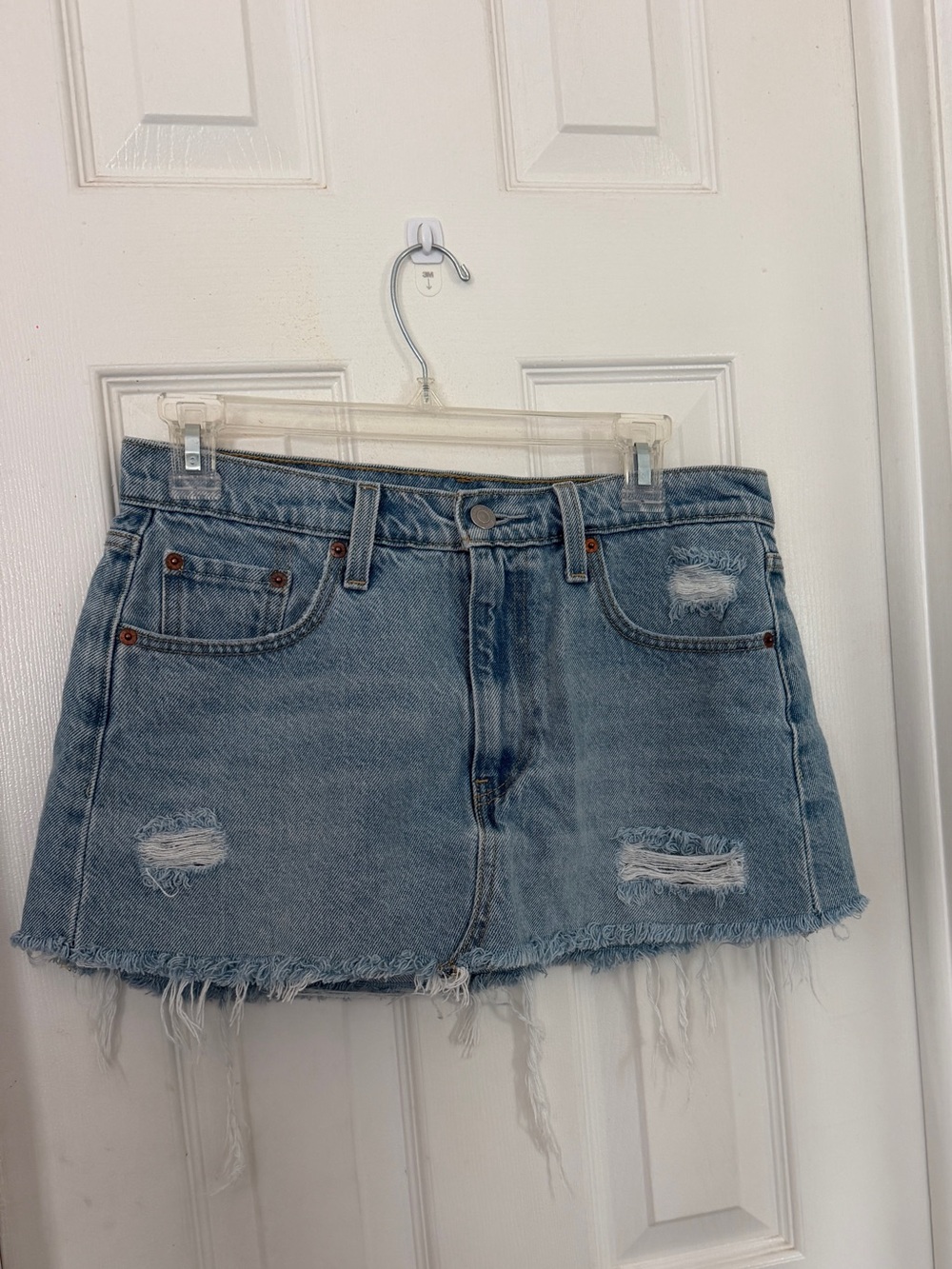 Levi’s Light Blue Distressed Denim Mini Skirt